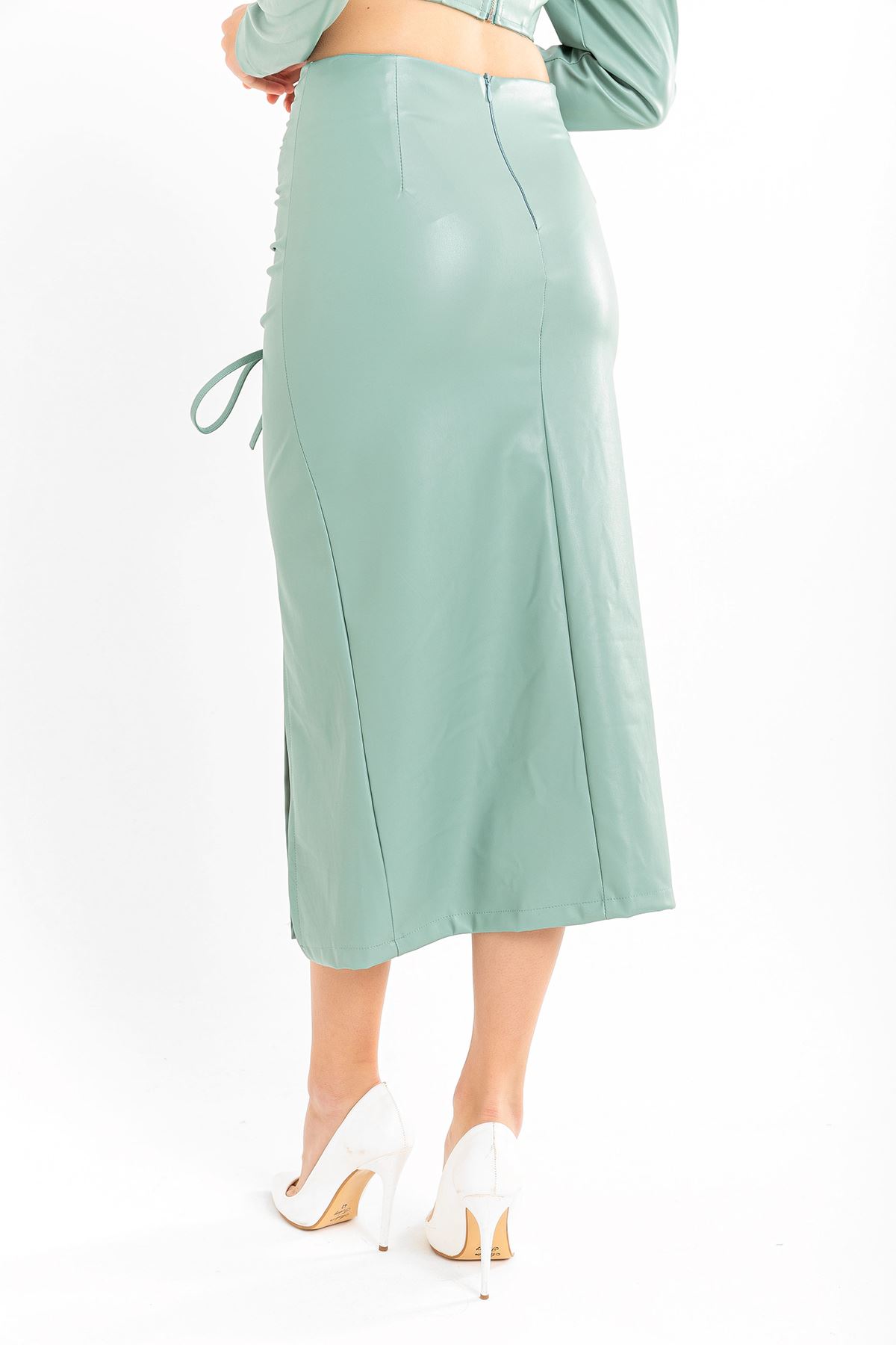 تنورة نسائية قماش جلد تحت الركبتين - اخضر فاتح